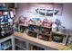 A view of a well-stocked pantry with shelves of food, a mini fridge, and various storage containers at 643 Harlan St, Plainfield, IN 46168