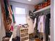 Walk-in closet featuring lots of storage space, shelving and natural light at 643 Harlan St, Plainfield, IN 46168