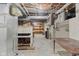 Unfinished basement showcasing exposed beams, utility systems, and ample open space for versatile customization options at 649 Lawndale Dr, Plainfield, IN 46168