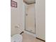 This bathroom features a low-flow toilet, tile flooring, and a stand-up shower at 649 Lawndale Dr, Plainfield, IN 46168