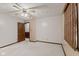 This bedroom features neutral carpet, and a ceiling fan with overhead lighting at 649 Lawndale Dr, Plainfield, IN 46168