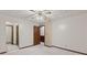 This bedroom features neutral carpet, and a ceiling fan with overhead lighting at 649 Lawndale Dr, Plainfield, IN 46168