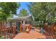 Beautiful deck with wood railing overlooking the backyard at 649 Lawndale Dr, Plainfield, IN 46168