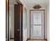 Light and bright entryway with decorative door and classic accents at 649 Lawndale Dr, Plainfield, IN 46168