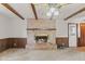 Relaxing living room with brick fireplace and carpeted floors at 649 Lawndale Dr, Plainfield, IN 46168
