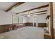 Inviting living room featuring a brick fireplace and exposed ceiling beams at 649 Lawndale Dr, Plainfield, IN 46168