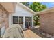 Cozy covered patio with brick pavers, perfect for relaxation and outdoor gatherings at 649 Lawndale Dr, Plainfield, IN 46168