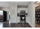 Galley kitchen with stainless steel appliances and built-in microwave at 725 2Nd St, Shelbyville, IN 46176