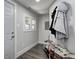 Mud room off garage with space for shoes and coats at 725 2Nd St, Shelbyville, IN 46176