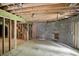 Unfinished basement displaying cinder block wall, open ceiling with recessed lighting and exposed ductwork at 7843 E Triple Crown Ln, Camby, IN 46113