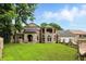 Stunning brick home with a large front yard, stone archway, and attached garage at 7843 E Triple Crown Ln, Camby, IN 46113