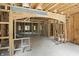 Interior view of wooden framing construction featuring an archway and plentiful natural light at 7843 E Triple Crown Ln, Camby, IN 46113