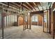 Bright room displaying unfinished wood, windows and unfinished ceilings, ready for customization at 7843 E Triple Crown Ln, Camby, IN 46113