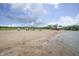 Wide beach with a playground and covered picnic area at 8167 Center Lake Rd, Nineveh, IN 46164