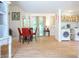Open-concept dining room with hardwood floors connects seamlessly to the living and kitchen areas at 8167 Center Lake Rd, Nineveh, IN 46164