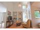 Bright living room with vaulted ceilings, built-in shelves, and cozy furniture at 8167 Center Lake Rd, Nineveh, IN 46164