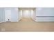 Large basement area with neutral carpeting and a doorway to another room at 8909 Carnation Dr, Noblesville, IN 46060
