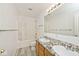 Bright bathroom featuring double sinks and a shower-tub combo at 8909 Carnation Dr, Noblesville, IN 46060
