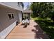 Beautiful deck with table and seating, perfect for outdoor entertaining and relaxation at 8909 Carnation Dr, Noblesville, IN 46060