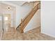 Inviting hallway with tiled floor leads to other rooms at 8909 Carnation Dr, Noblesville, IN 46060