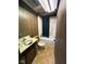 Bathroom featuring a sink, toilet, and bathtub with shower in need of repair at 906 Hemlock St, Shelbyville, IN 46176