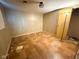 View of a bedroom showcasing paneling, with a light fixture, and floor lamp at 906 Hemlock St, Shelbyville, IN 46176