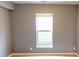 Bedroom featuring beige carpet, neutral paint, and a window at 9404 Crystal River Dr, Indianapolis, IN 46240