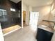 Elegant bathroom with a walk-in shower, double sink vanity and an open concept layout at 9404 Crystal River Dr, Indianapolis, IN 46240