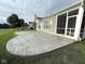 Beautiful stamped concrete patio overlooking the lake and screened porch, perfect for outdoor living at 9404 Crystal River Dr, Indianapolis, IN 46240