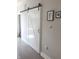 Interior view of a white sliding barn door at 955 Dorman St, Indianapolis, IN 46202