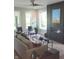 Stylish living room with a modern fireplace, comfortable couch, and large windows offering ample natural light at 955 Dorman St, Indianapolis, IN 46202