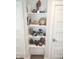 Built-in shelving showcasing decorative items adds charm at 955 Dorman St, Indianapolis, IN 46202