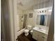 Clean and functional bathroom featuring a shower over bath and white cabinetry at 9621 Gemini Dr, Indianapolis, IN 46229