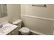 A clean bathroom featuring a toilet, and sink at 9621 Gemini Dr, Indianapolis, IN 46229