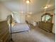 Spacious main bedroom with an ornate gold bed frame and lots of room for furniture at 9621 Gemini Dr, Indianapolis, IN 46229