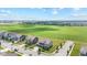 An aerial view of a beautifully designed neighborhood features well-manicured lawns and modern homes at 9986 Gallop Ln, Fishers, IN 46040