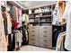 Beautiful walk-in closet featuring custom shelving and drawer storage for optimal organization at 9986 Gallop Ln, Fishers, IN 46040
