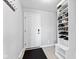 Functional entryway with a shoe rack and a sleek door mat at 9986 Gallop Ln, Fishers, IN 46040