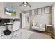 Stylish home office with modern furnishings, a comfortable workspace, and motivational wall art at 9986 Gallop Ln, Fishers, IN 46040