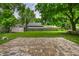 Spacious backyard with shed, picnic table, and brick patio at 10155 Orchard Park W Dr, Carmel, IN 46280