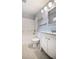 Bright bathroom features a tub-shower combo, white vanity, and modern fixtures at 10155 Orchard Park W Dr, Carmel, IN 46280