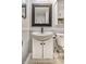 Close up of bright bathroom vanity and toilet at 10155 Orchard Park W Dr, Carmel, IN 46280