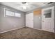 Comfortable bedroom with closet, fan, and natural light at 10155 Orchard Park W Dr, Carmel, IN 46280