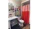 Bathroom featuring Peppa Pig decorations, a comfortable seat, and an accessible shower at 1050 Laguna Ln, Greenwood, IN 46143