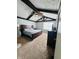 Comfortable bedroom with vaulted ceiling, exposed beams, carpeted flooring, and a classic dresser at 1050 Laguna Ln, Greenwood, IN 46143