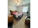 Comfortable bedroom with natural light and carpet floors at 1050 Laguna Ln, Greenwood, IN 46143