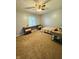 Cozy bedroom with natural light, carpet flooring, and a unique desk area at 1050 Laguna Ln, Greenwood, IN 46143