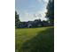 Brick home with attached garage and well maintained lawn at 1050 Laguna Ln, Greenwood, IN 46143