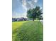 Brick home with attached garage and well maintained lawn at 1050 Laguna Ln, Greenwood, IN 46143