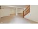 Spacious finished basement featuring neutral carpet, a stairway and multiple support columns at 1246 Valdosta Pl, Westfield, IN 46074